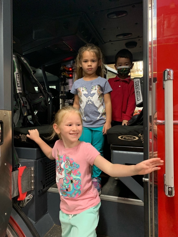 students in a fire truck